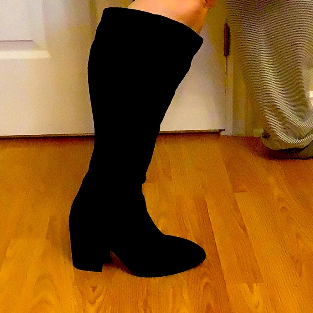 Torrid boots brand new- a bit two wide for me after weight loss